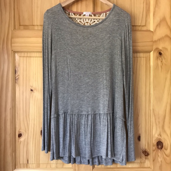 Xhilaration Tops - Xhiliration crochet ruffle bottom tunic size M